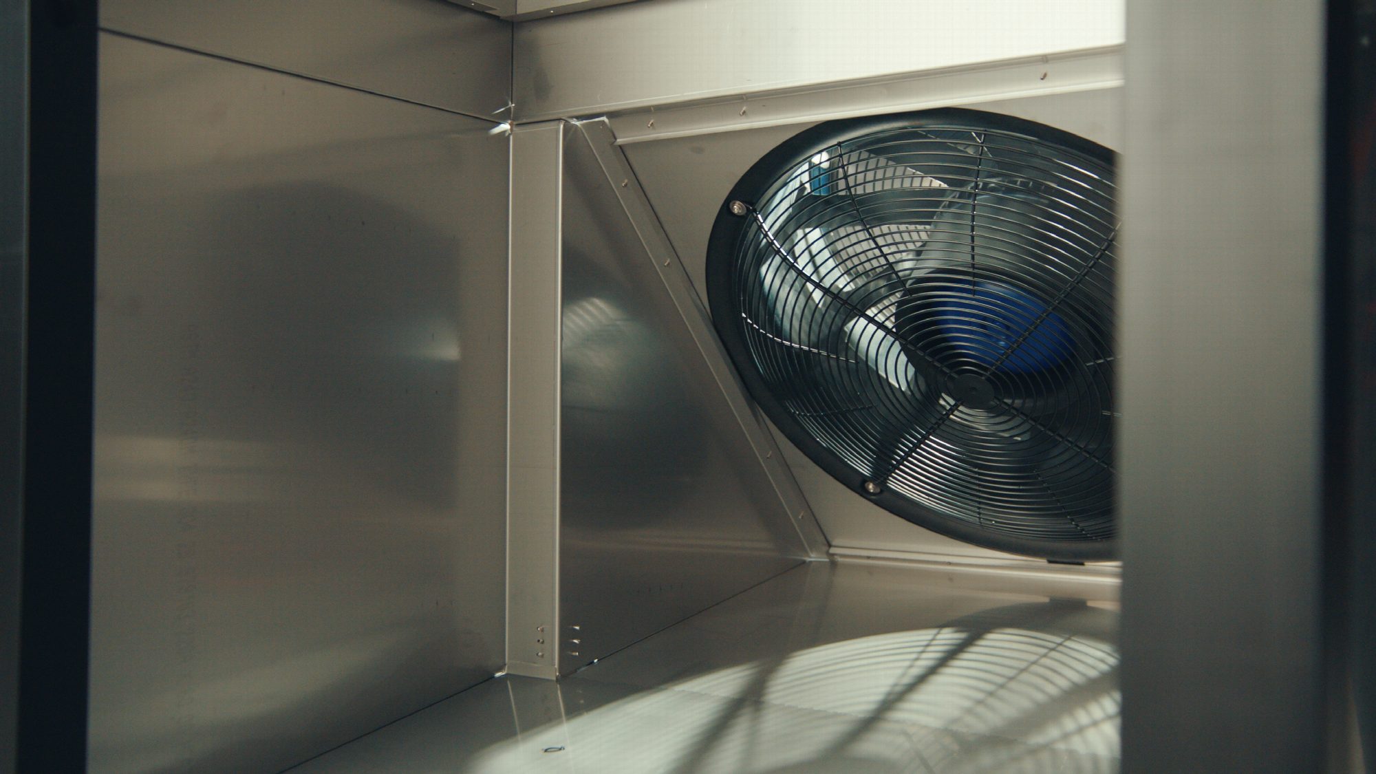Inside the QFM air plenum showing the high-velocity EC fan