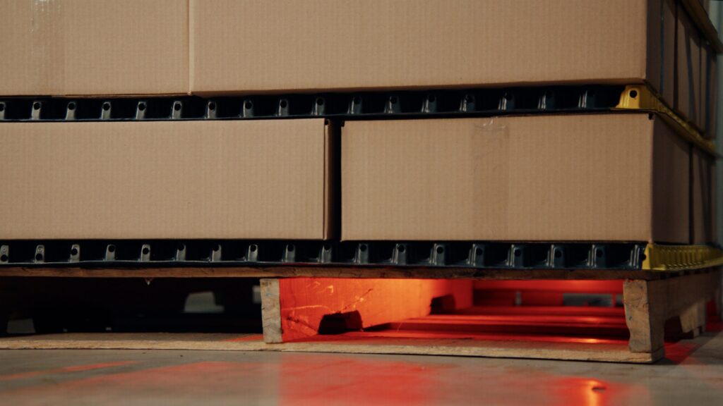 Status light glowing through the pallet spacers showing airflow channels