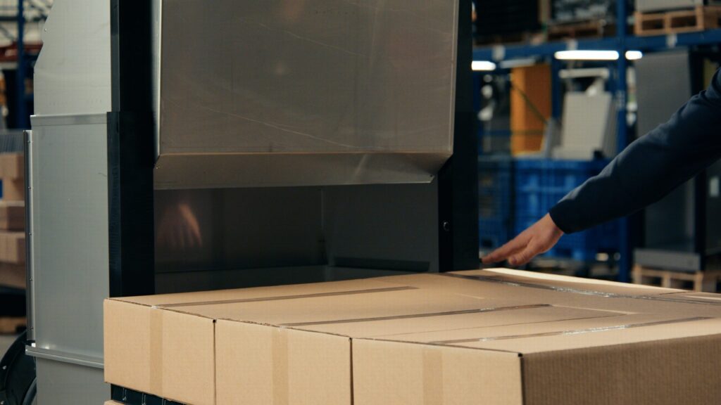 A short pallet stack staged next to a QFM